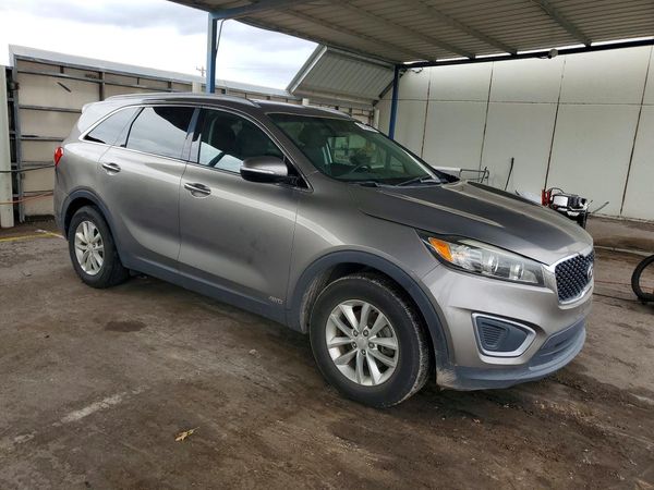 2016 KIA SORENTO L / LX — Passenger 3/4