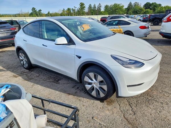 2023 TESLA MODEL Y — Passenger 3/4
