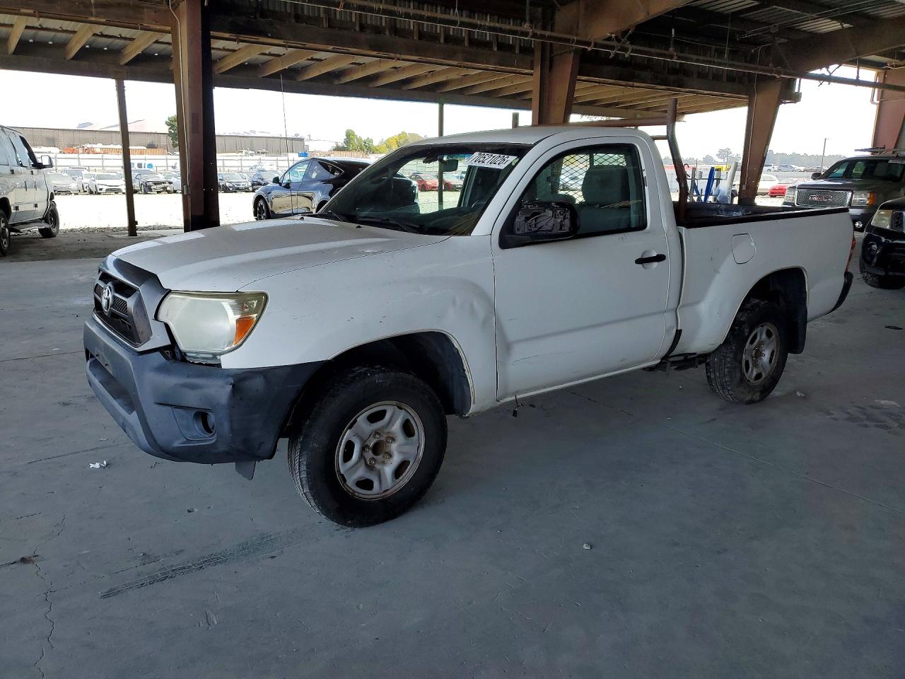 2013 TOYOTA TACOMA Delux — Front 3/4