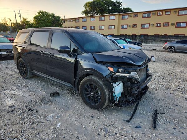 2023 KIA CARNIVAL LX, LX Seat Package — Passenger 3/4