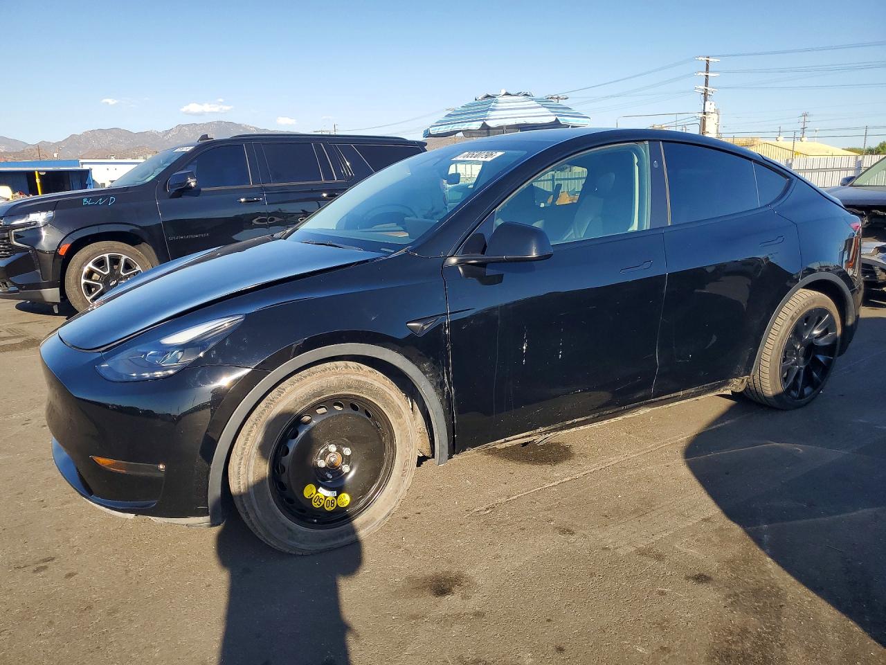2023 TESLA MODEL Y — Front 3/4