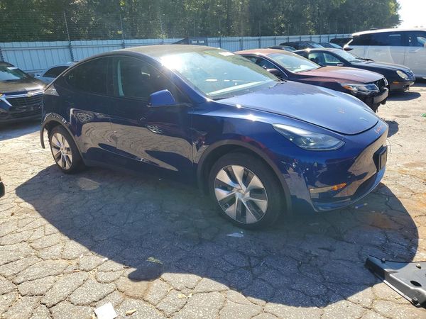 2023 TESLA MODEL Y — Passenger 3/4