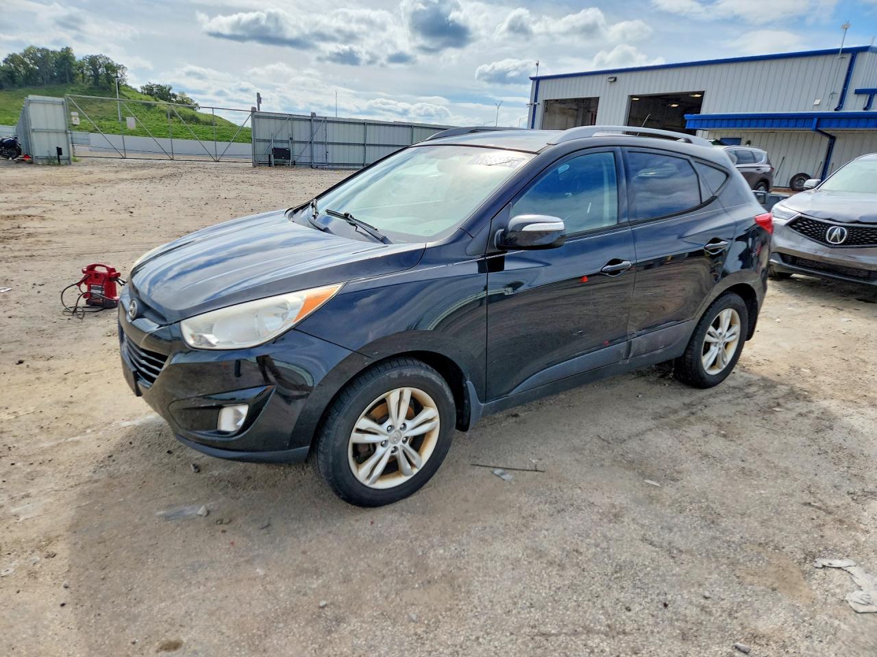2013 HYUNDAI TUCSON — Front 3/4