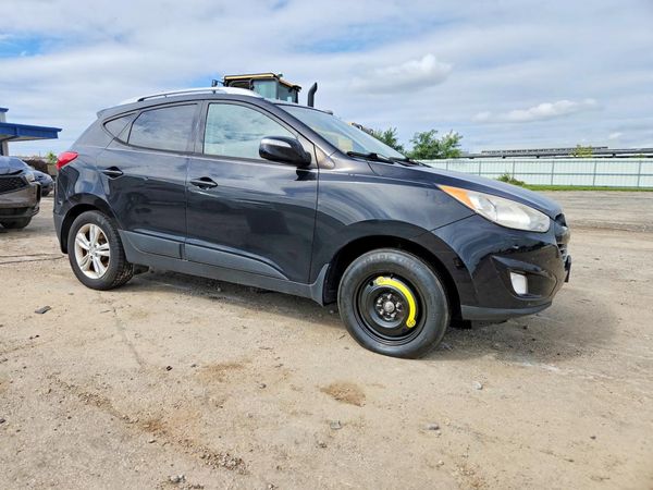 2013 HYUNDAI TUCSON — Passenger 3/4