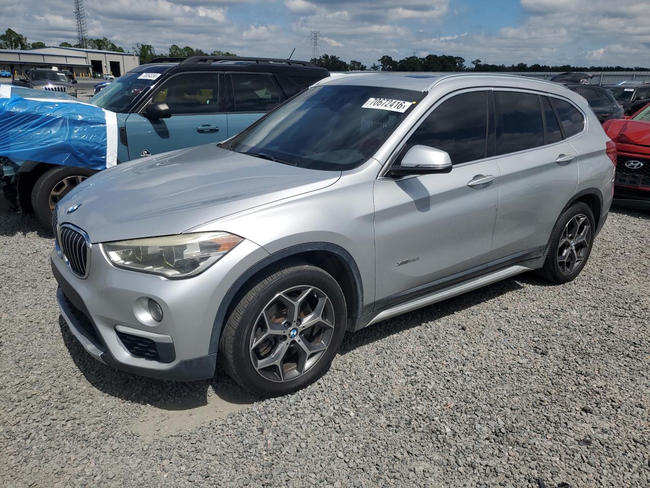 2017 BMW X1 xDrive28iBr — Front 3/4