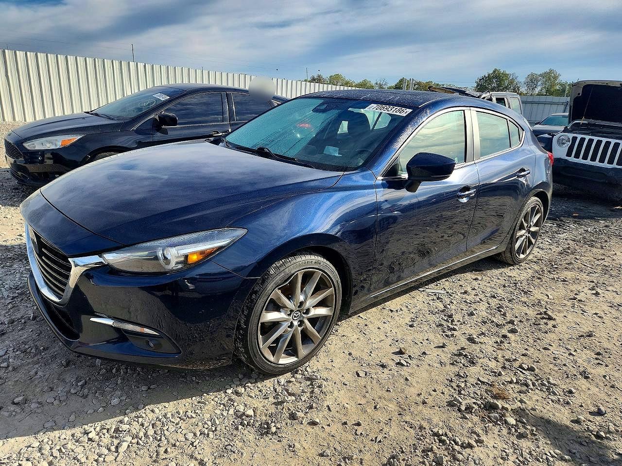 2018 MAZDA 3 Grand Touring — Front 3/4