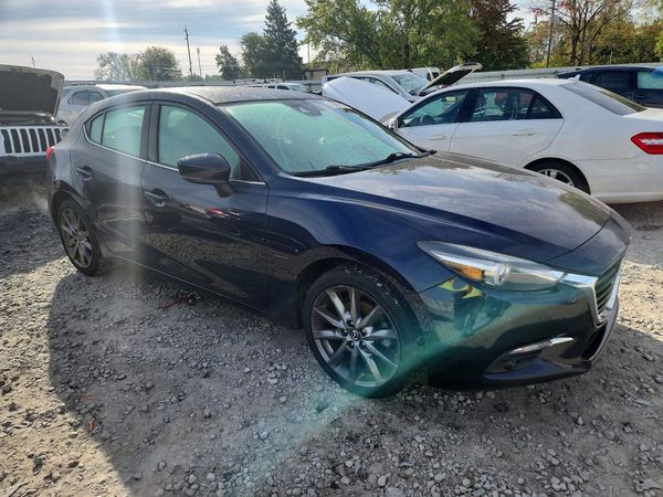 2018 MAZDA 3 Grand Touring — Passenger 3/4