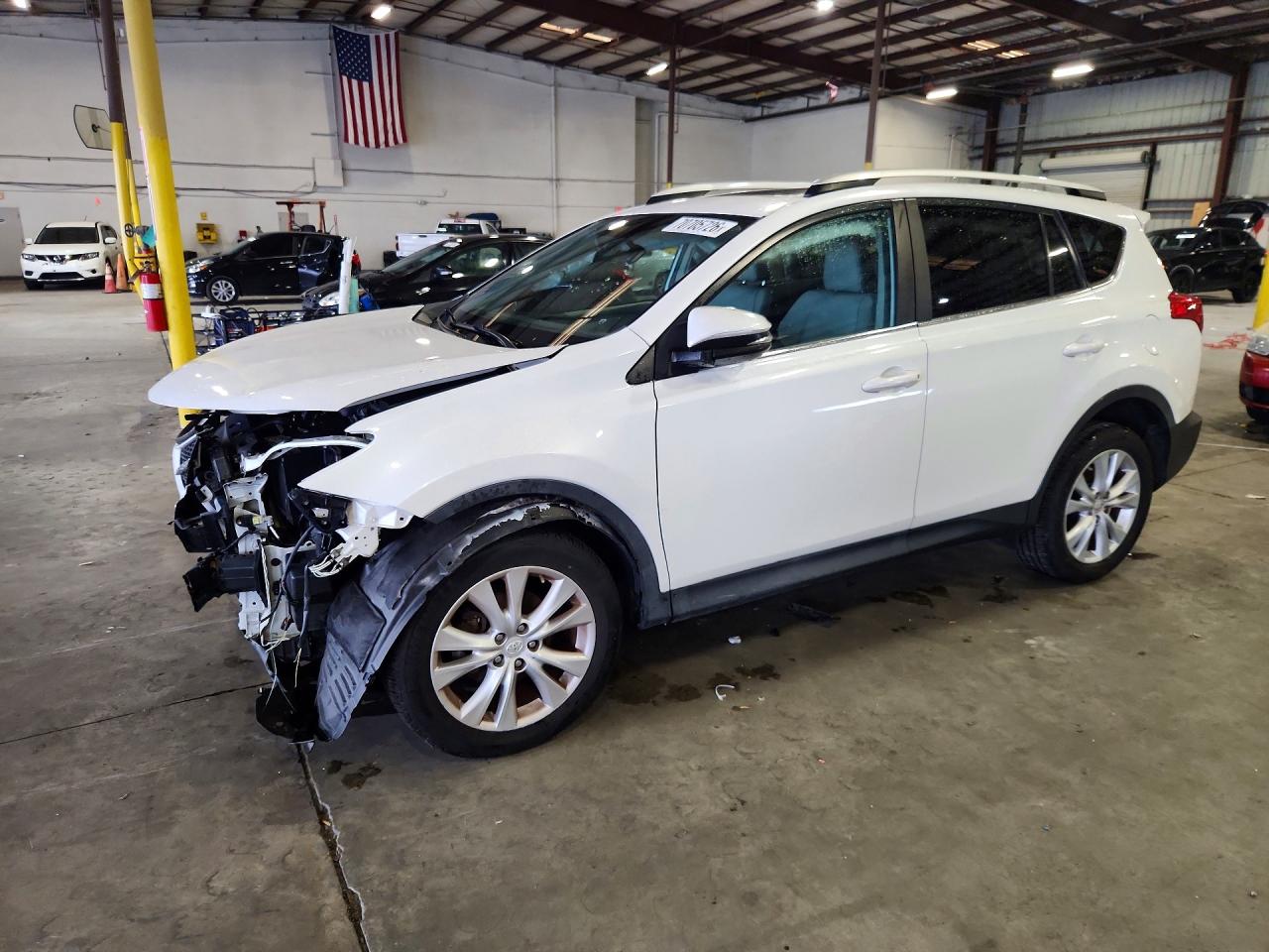 2013 TOYOTA RAV4 High — Front 3/4
