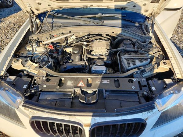 2012 BMW X3 xDrive28i — Engine bay