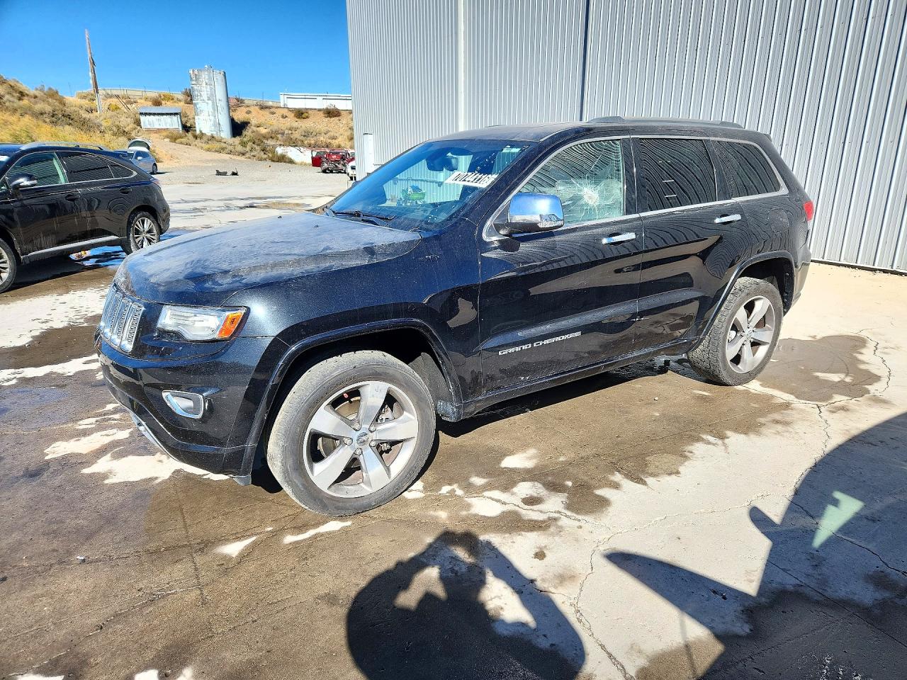 2014 JEEP CHEROKEE Overland — Front 3/4
