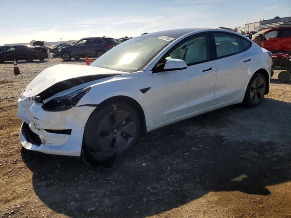 2023 TESLA MODEL 3 — Front 3/4