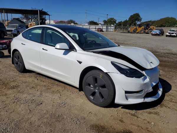 2023 TESLA MODEL 3 — Passenger 3/4