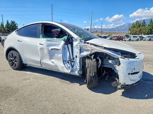 2024 TESLA MODEL Y — Passenger 3/4