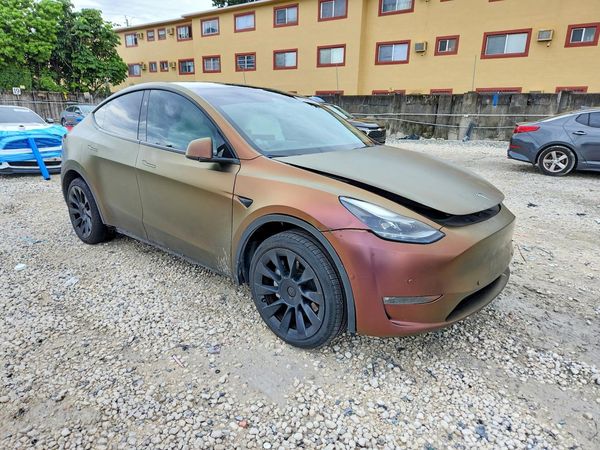 2023 TESLA MODEL Y — Passenger 3/4