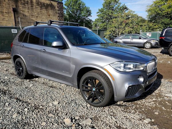 2017 BMW X5 xDrive40e — Passenger 3/4