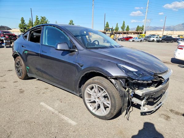 2024 TESLA MODEL Y — Passenger 3/4