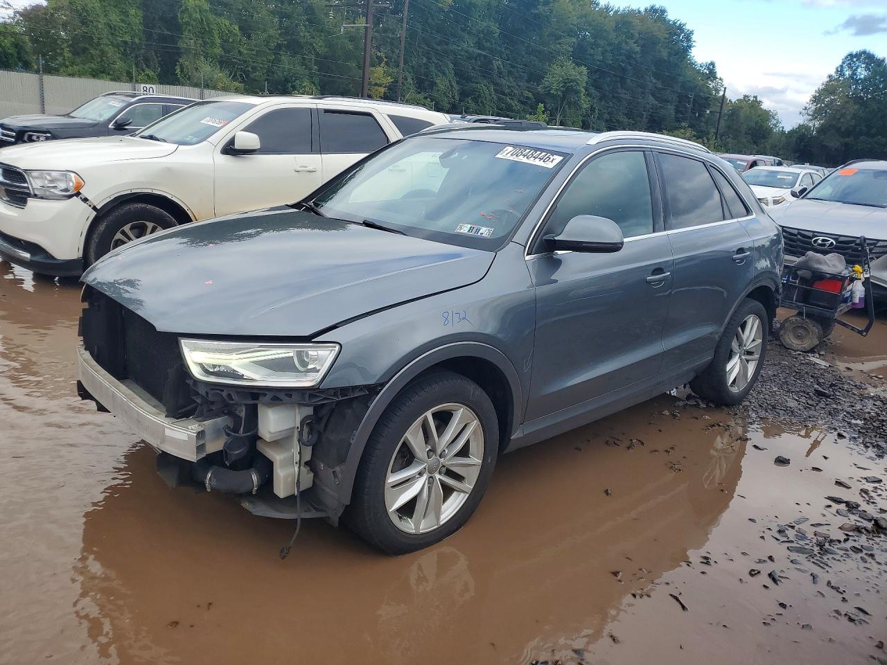 2016 AUDI Q3 quattro Premium Plus — Front 3/4