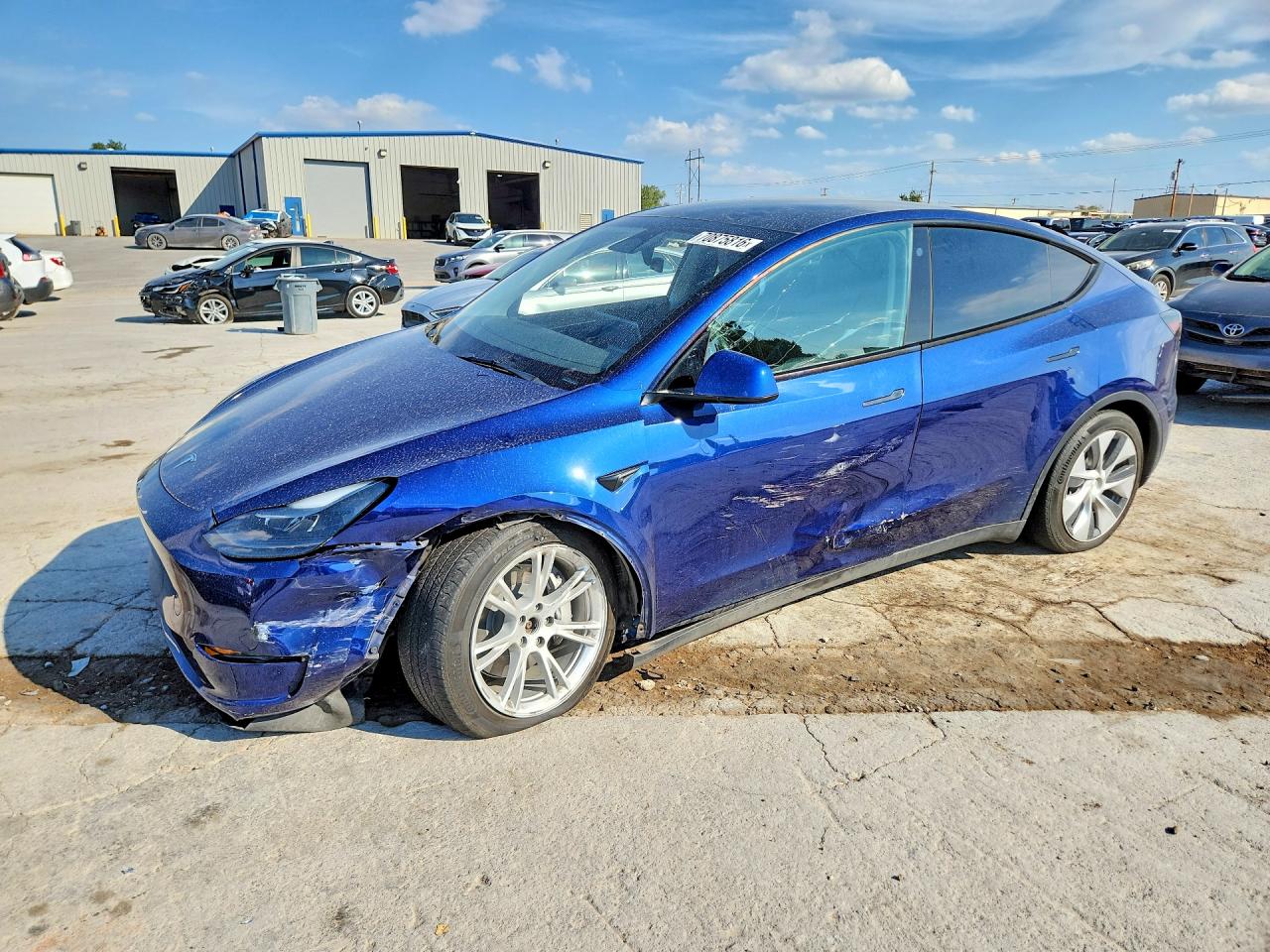 2023 TESLA MODEL Y — Front 3/4