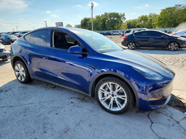 2023 TESLA MODEL Y — Passenger 3/4
