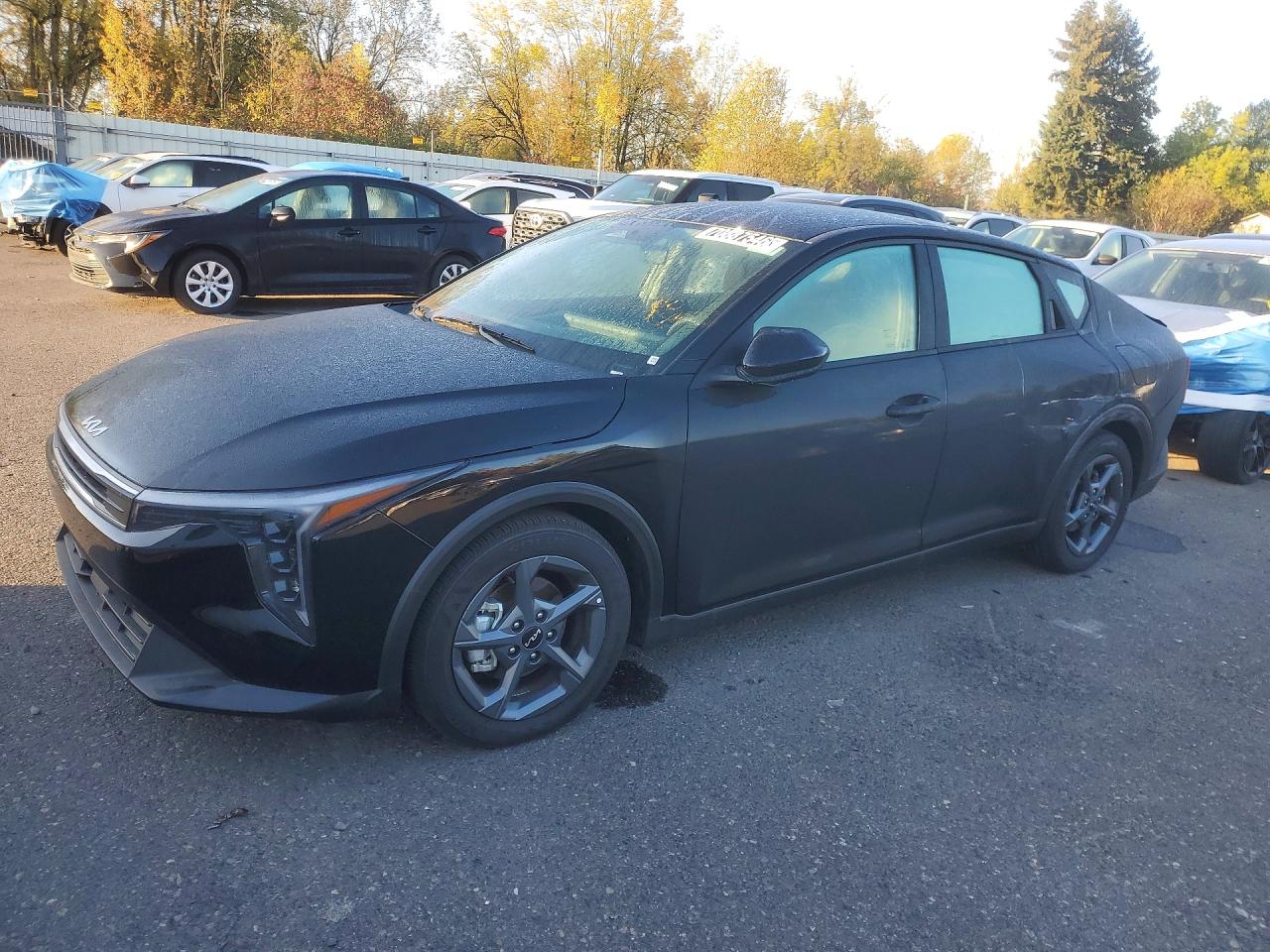 2026 KIA K4 LX, LXS — Front 3/4