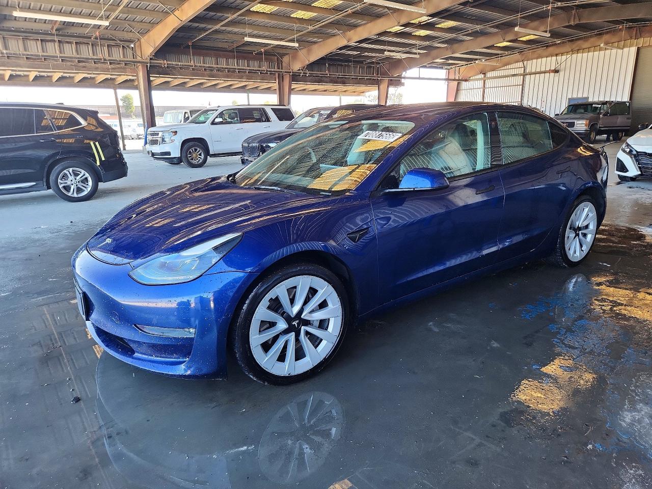 2022 TESLA MODEL 3 — Front 3/4