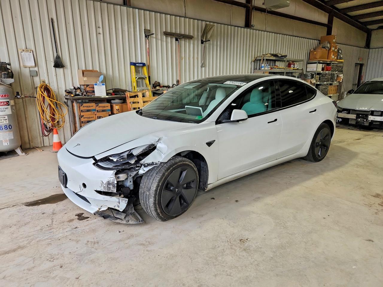 2021 TESLA MODEL 3 — Front 3/4