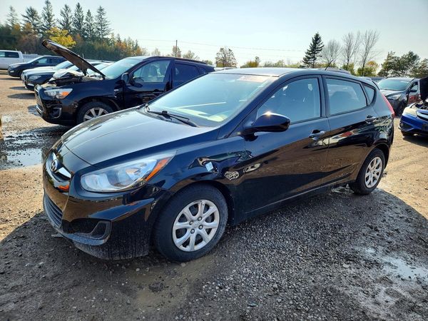 2014 HYUNDAI ACCENT 5DR GS / 4DR GLS — Front 3/4