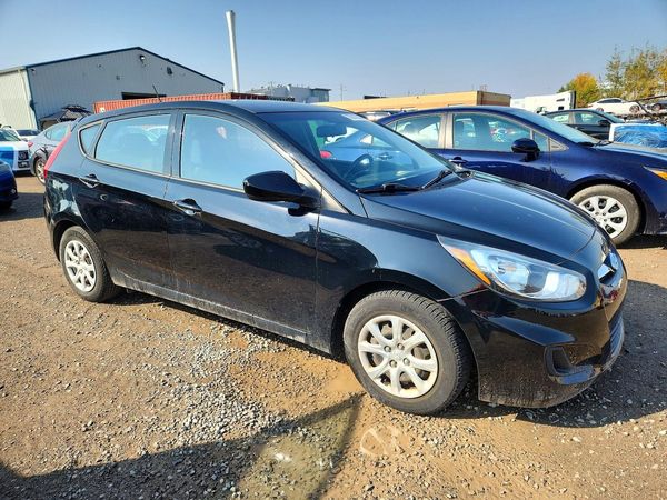 2014 HYUNDAI ACCENT 5DR GS / 4DR GLS — Passenger 3/4