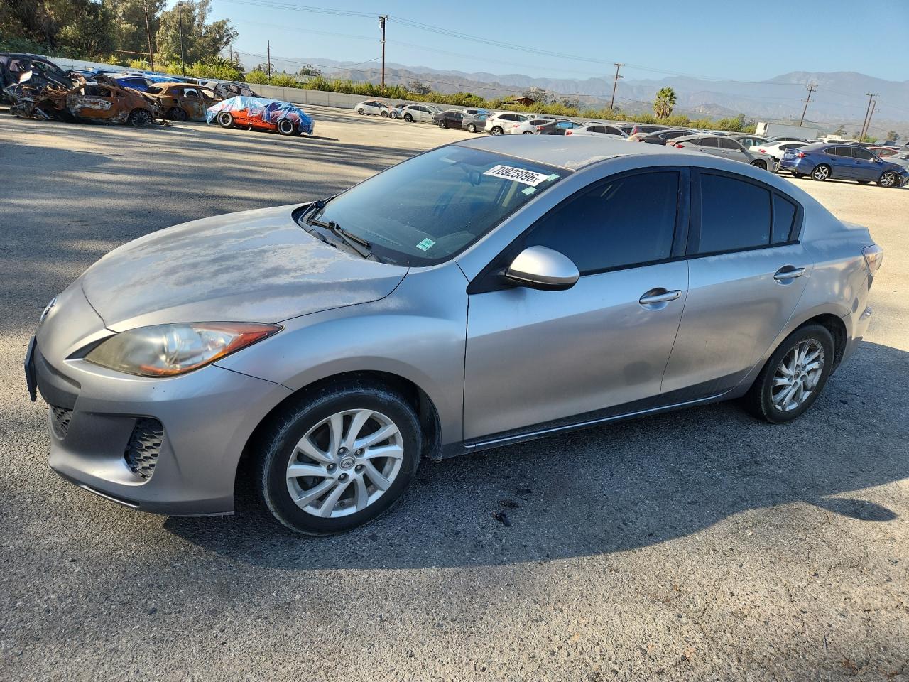 2012 MAZDA 3 Touring/GS — Front 3/4