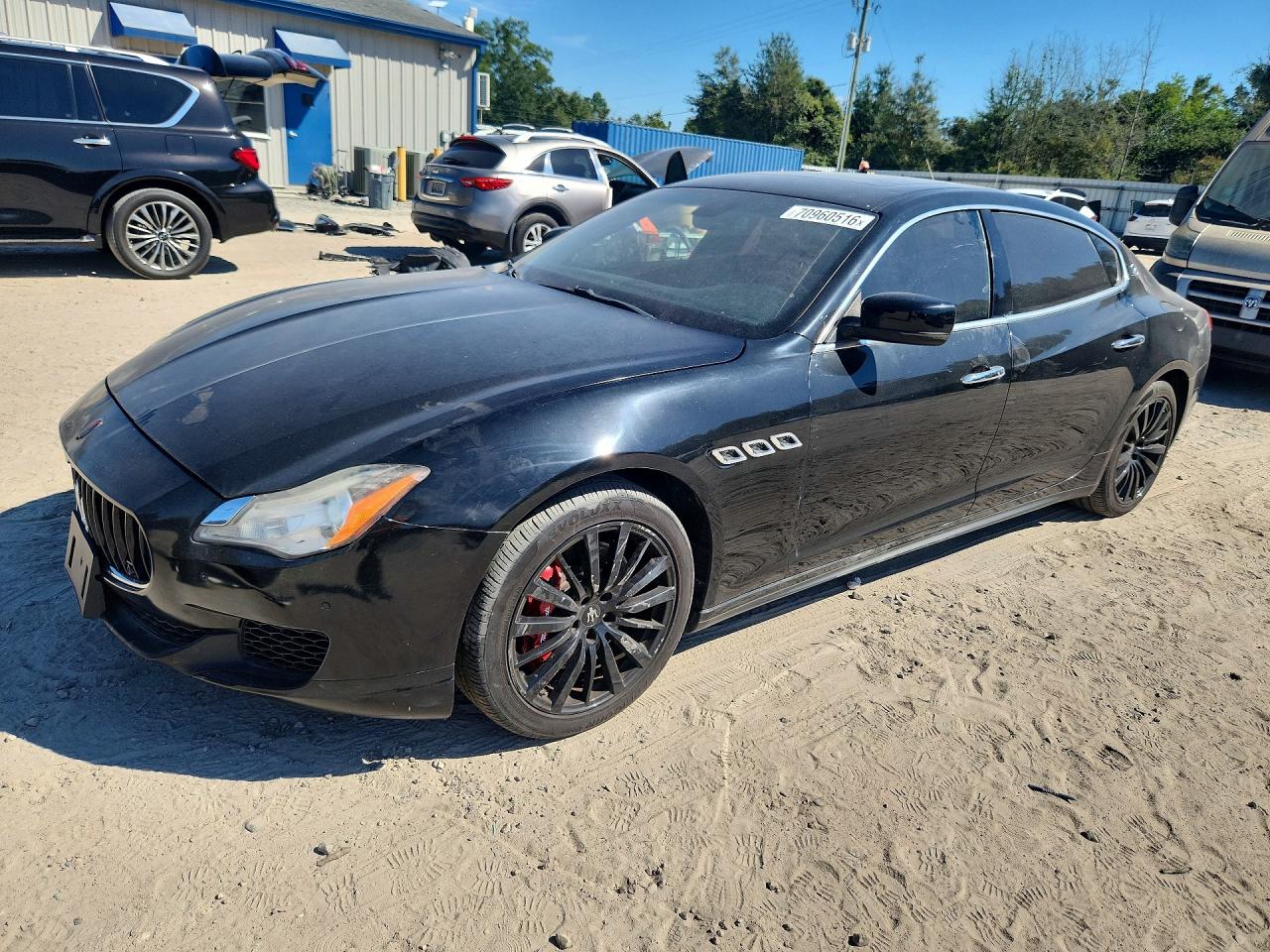 2016 MASERATI QUATTROPORTE Essence — Front 3/4