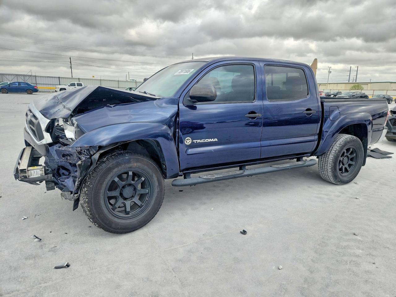 2013 TOYOTA TACOMA Delux — Front 3/4