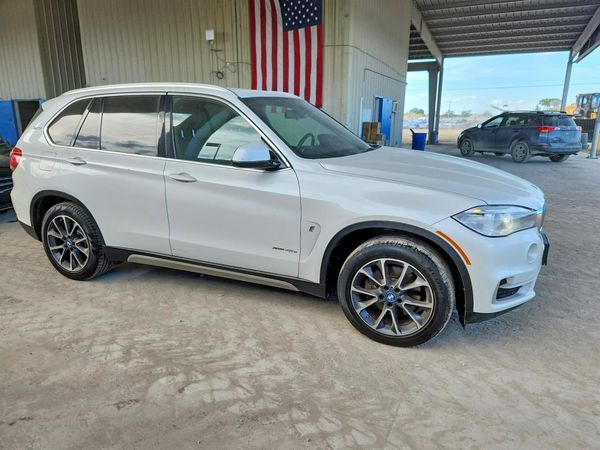 2018 BMW X5 xDrive40e — Passenger 3/4