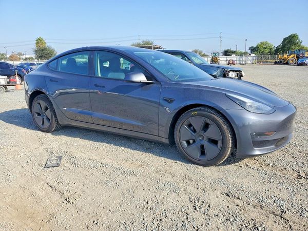 2023 TESLA MODEL 3 — Passenger 3/4