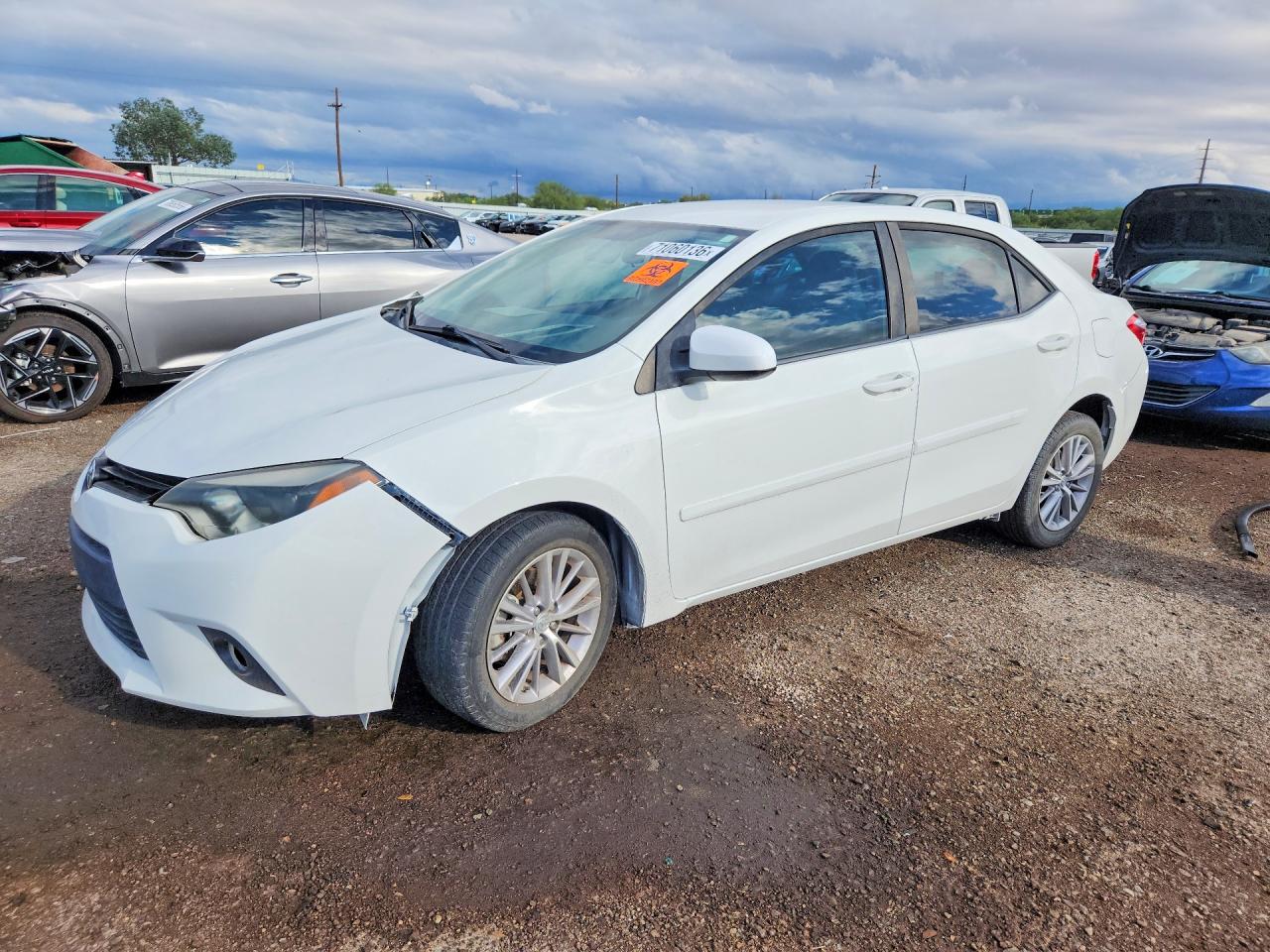 2014 TOYOTA COROLLA L/LE — Front 3/4