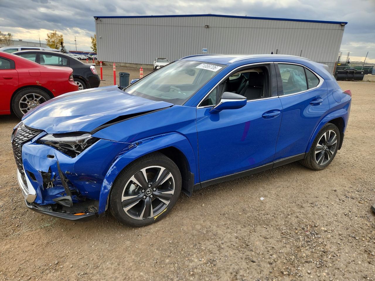 2024 LEXUS UX 250h Luxury — Front 3/4