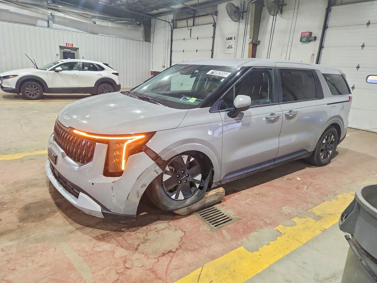 2027 KIA CARNIVAL LXS — Front 3/4
