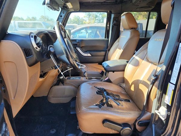 2014 JEEP WRANGLER Sahara — DENT