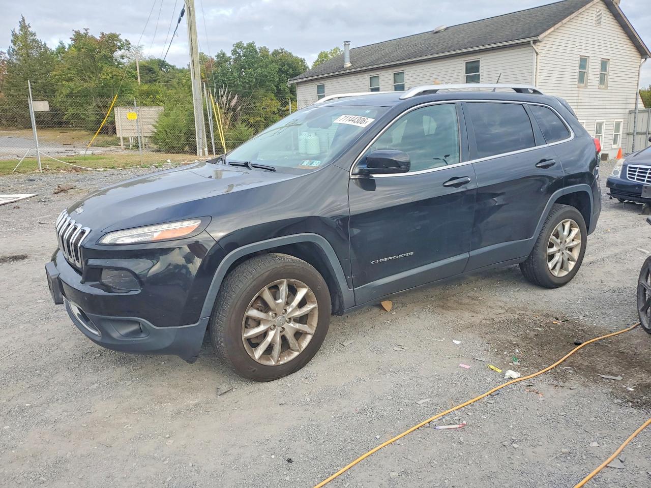 2015 JEEP CHEROKEE Limited — Front 3/4