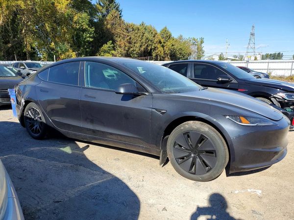2026 TESLA MODEL 3 — Passenger 3/4
