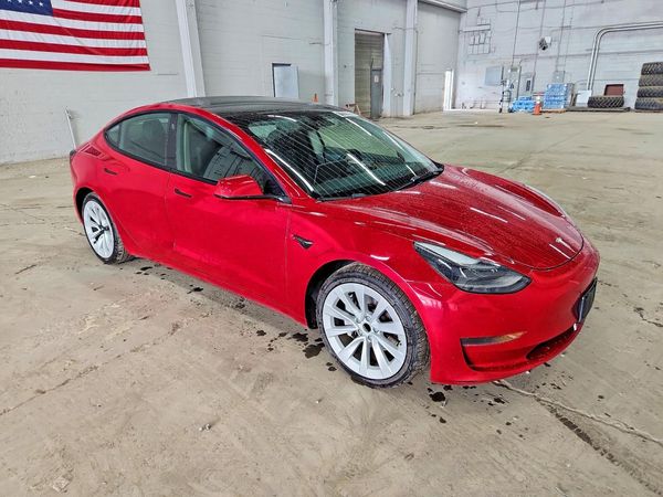 2023 TESLA MODEL 3 — Passenger 3/4