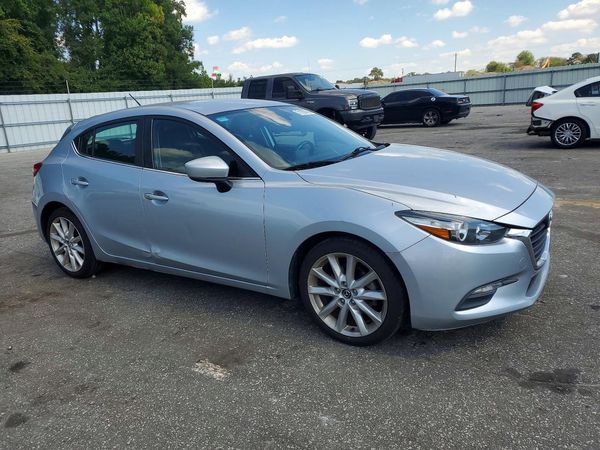 2017 MAZDA 3 Touring — Passenger 3/4