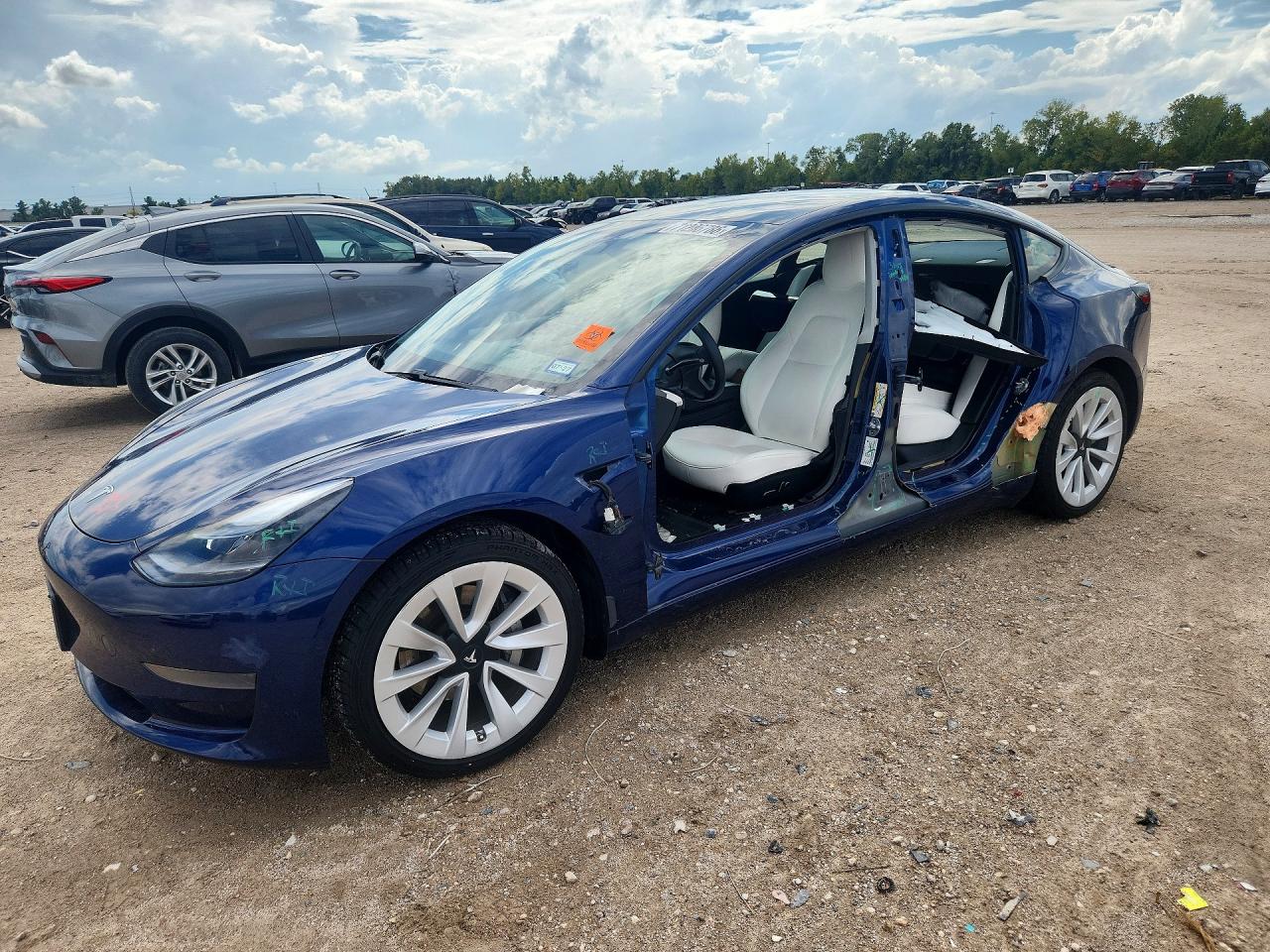 2021 TESLA MODEL 3 — Front 3/4