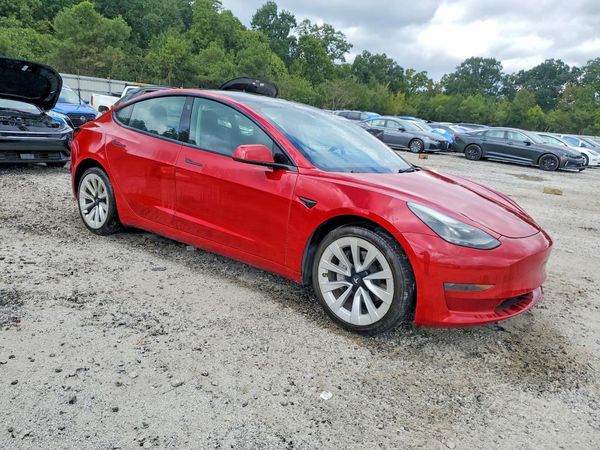 2023 TESLA MODEL 3 — Passenger 3/4