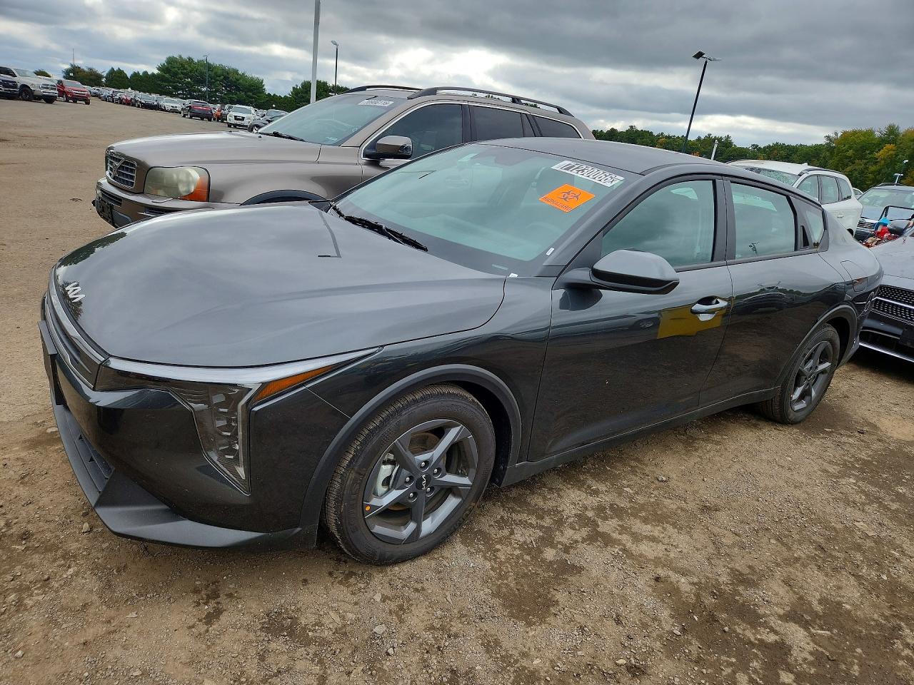 2026 KIA K4 LX, LXS — Front 3/4