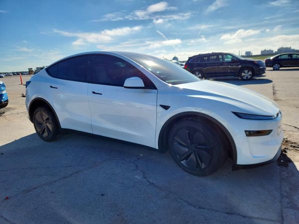 2026 TESLA MODEL Y — Passenger 3/4