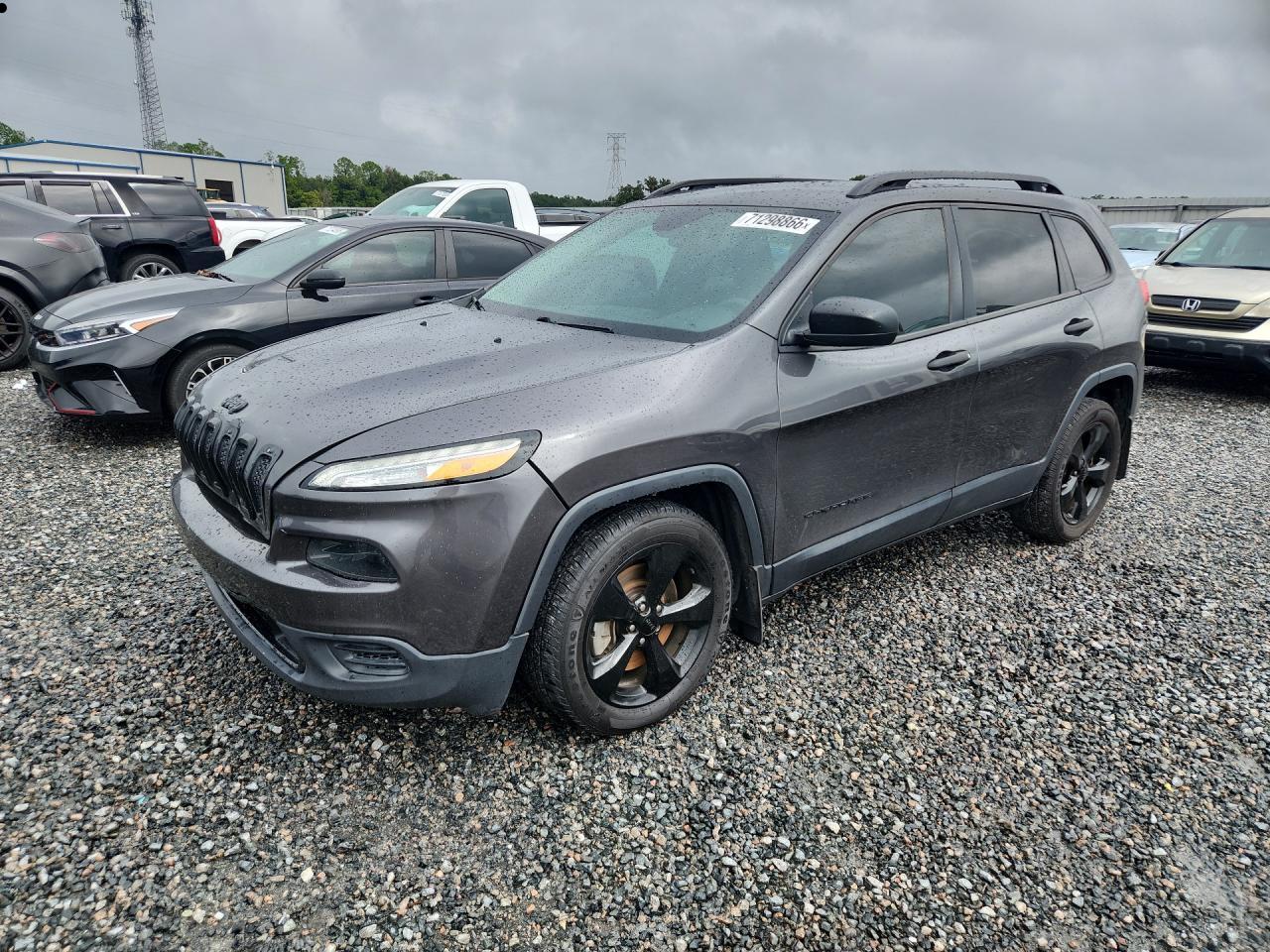 2016 JEEP CHEROKEE Sport — Front 3/4