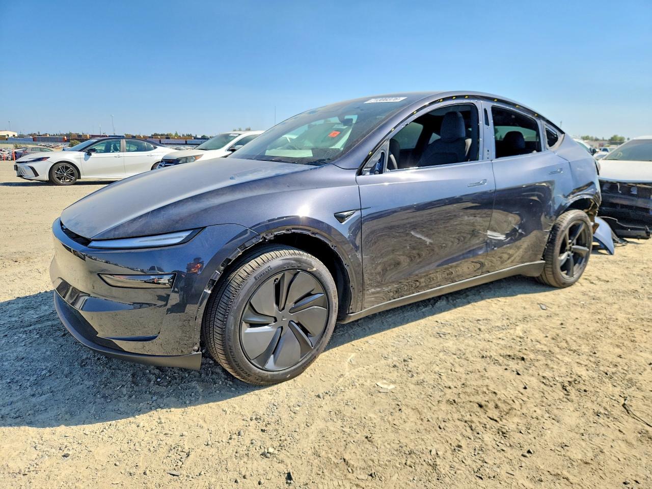 2026 TESLA MODEL Y — Front 3/4