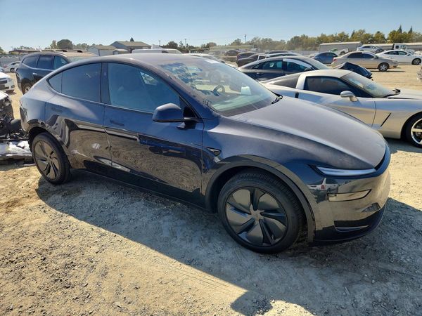 2026 TESLA MODEL Y — Passenger 3/4