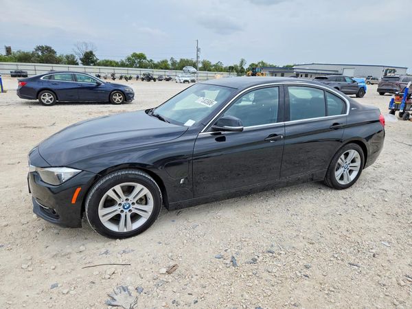 2017 BMW 330E — DSFA — Front 3/4