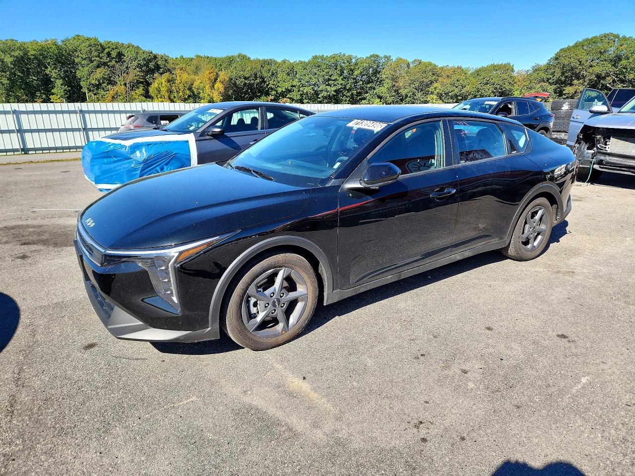 2026 KIA K4 LX, LXS — Front 3/4